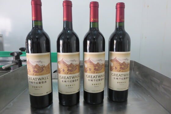 Fully Automatic Vertical Positioning Round Bottle Labeling Machine For Red Wine Pill Bottle Food Can